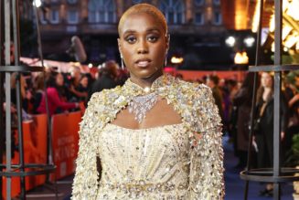 Lashana Lynch Glistens in a Gold Sequinned Cape at “The Woman King” Premiere