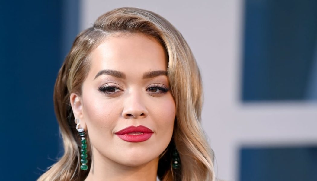 Rita Ora Showcases Lower Hip Tattoo in Extreme Cutout Jeans and Denim Crop Top