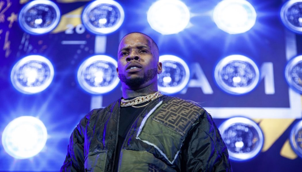 Tory Lanez All Smiles After Being Blessed With His New Jewelry, An Ankle Monitor Bracelet