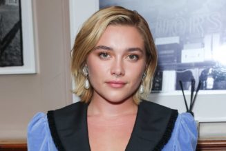 Florence Pugh Brings the Drama in a Silk Slip Dress with Thigh-High Slit and Ruffled Cape