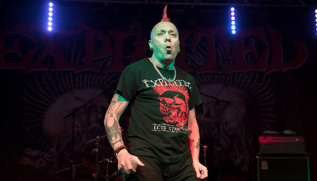 The Exploited’s Wattie Buchan Collapses Onstage After Suffering Suspected Heart Attack