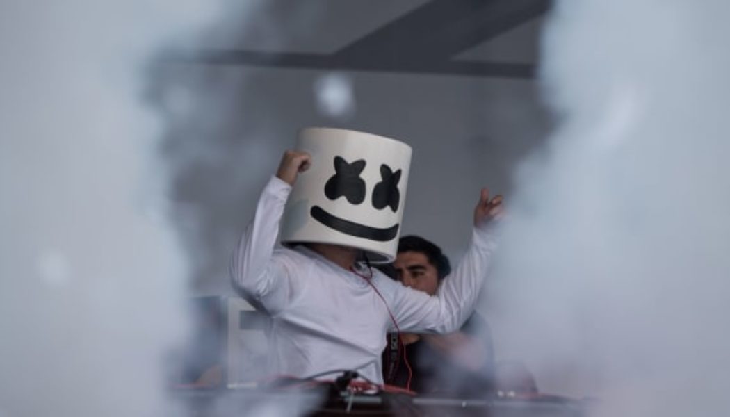 Cringe: Watch Gullible Fans Swarm a Prankster In a Knockoff Marshmello Helmet