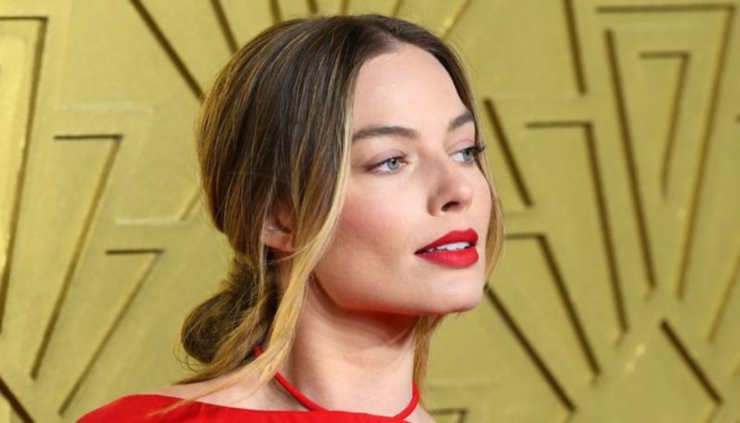 Margot Robbie’s Backless Caped Gown Deserves to Be Seen From Every Angle