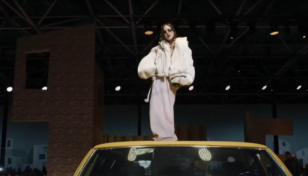 Rosalía Performs Atop a Lowrider at Louis Vuitton Fashion Show: Watch