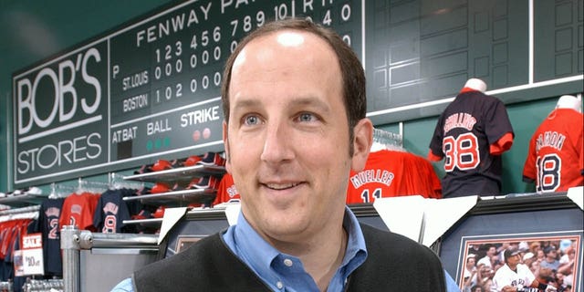 Boston Herald sports columnist Tony Massarotti signs copies of his book "A Tale of Two Cities" at the new Bob's Store in Somerville grand opening April 28, 2005.