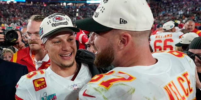 Kansas City Chiefs quarterback Patrick Mahomes, left, and tight end Travis Kelce celebrate their victory over the Philadelphia Eagles in Super Bowl LVII at State Farm Stadium in Glendale, Arizona, on Sunday.