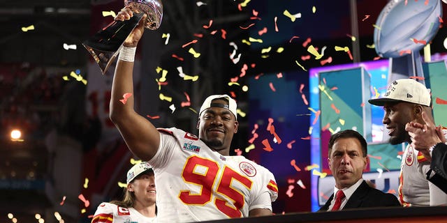 Chris Jones, #95 of the Kansas City Chiefs, celebrates with the Vince Lombardi Trophy after defeating the Philadelphia Eagles 38-35 in Super Bowl LVII at State Farm Stadium on Feb. 12, 2023 in Glendale, Arizona.