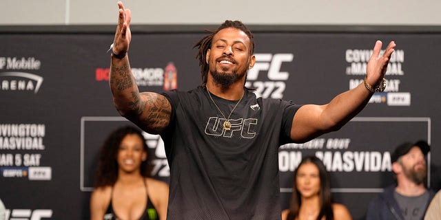 Greg Hardy poses on the scale during the UFC 272 ceremonial weigh-in at UFC T-Mobile Arena on March 04, 2022, in Las Vegas, Nevada.