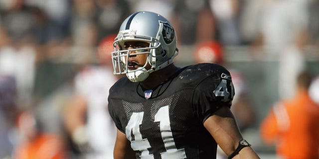 Eric Johnson #41 of the Oakland Raiders looks on against the Cincinnati Bengals on September 14, 2003 at Network Associates Coliseum in Oakland, California.