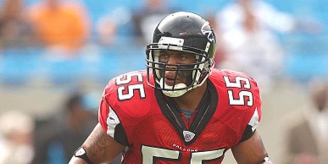 Eric Johnson #55 of the Atlanta Falcons warms up before a NFL football game against the Carolina Panthers on October 2, 2004 at Ericsson Stadium in Charlotte, North Carolina.