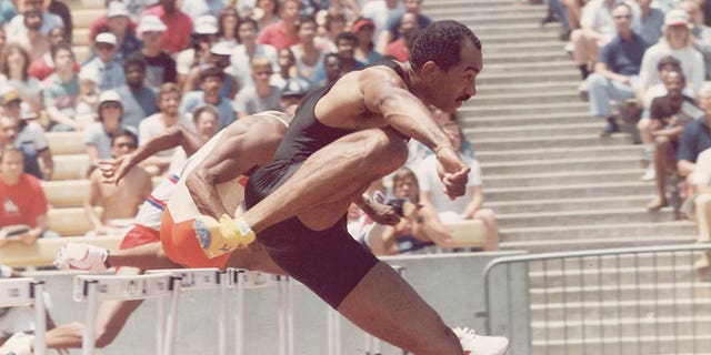 Greg Foster competes in an unidentified track and field event in the mid-1980s.