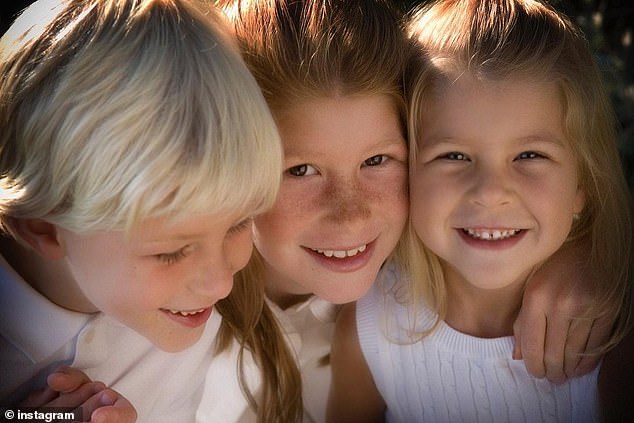 She also had a love of reading from a young age - something that she got from her father. She is seen (right) with her siblings