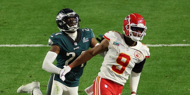 The Philadelphia Eagles' James Bradberry is called for holding against JuJu Smith-Schuster of the Kansas City Chiefs during the fourth quarter of Super Bowl LVII at State Farm Stadium in Glendale, Arizona, on Sunday.