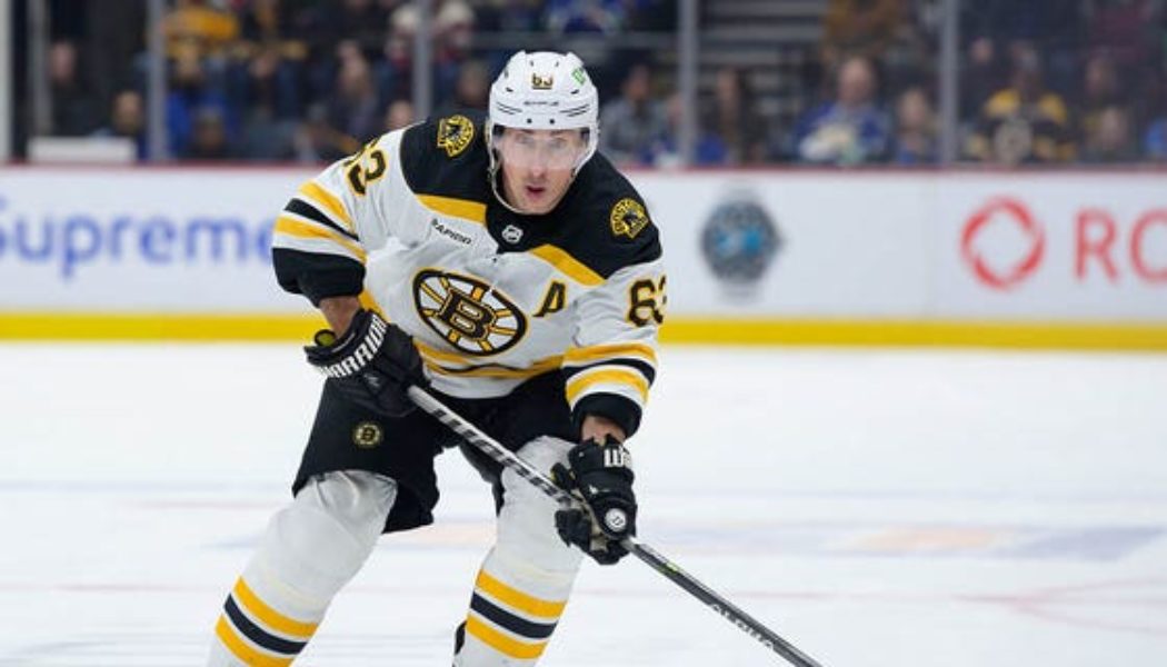 NHL referee takes out Bruins' Brad Marchand with surprise check in bizarre moment - Fox News