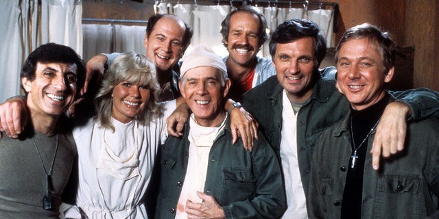 "M*A*S*H" sitcom actors, from left, Jamie Farr, Loretta Swit, David Ogden Stiers, Harry Morgan, Mike Farrell, Alan Alda and William Christopher in publicity portrait, circa 1978.