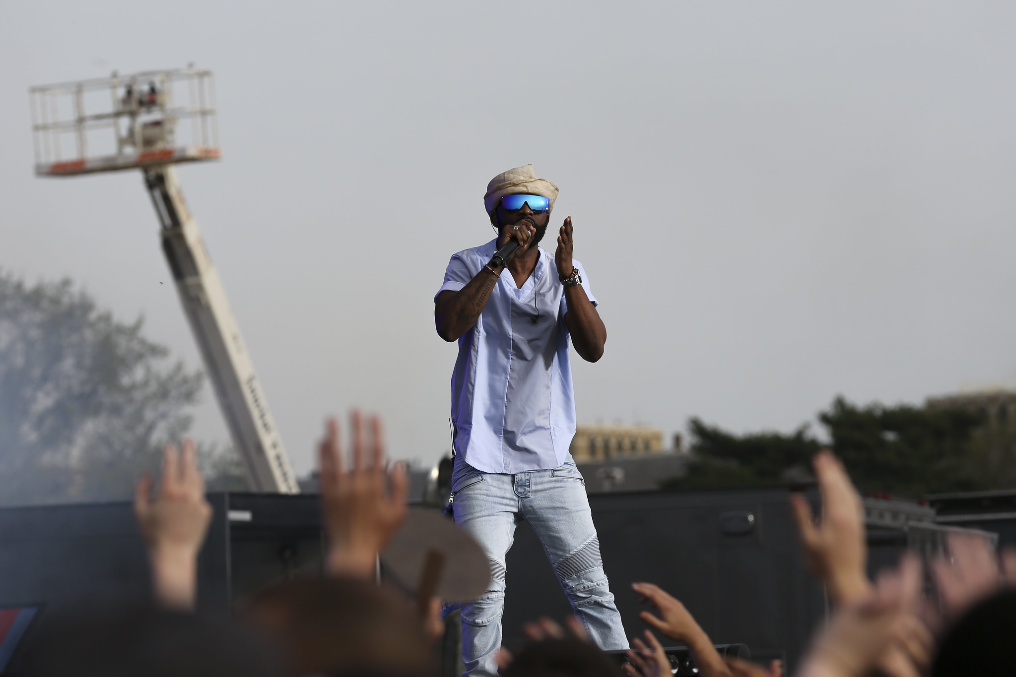 Fally Ipupa a Congolese singer-songwriter, dancer, philanthropist, guitarist and producer at a 2015 concert. Image source Lorie Shaull. Attribution 2.0 Generic (CC BY 2.0)