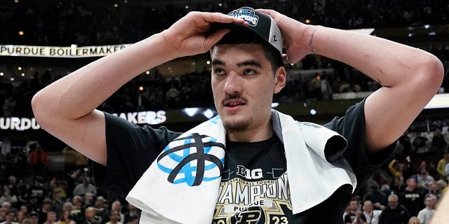 Purdue's Zach Edey celebrates his team's 67-65 win over Penn State for the Big Ten tournament championship in an NCAA college basketball game Saturday, March 11, 2023, in Chicago.