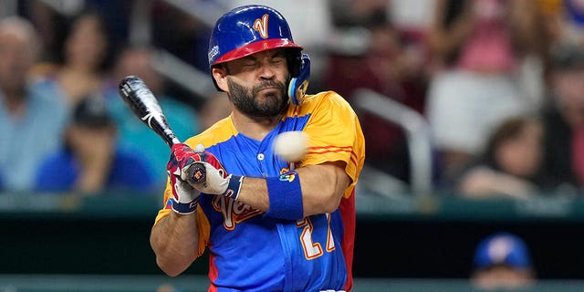 Venezuela's Jose Altuve is hit by a pitch during the fifth inning of a World Baseball Classic game against the U.S., Saturday, March 18, 2023, in Miami. 