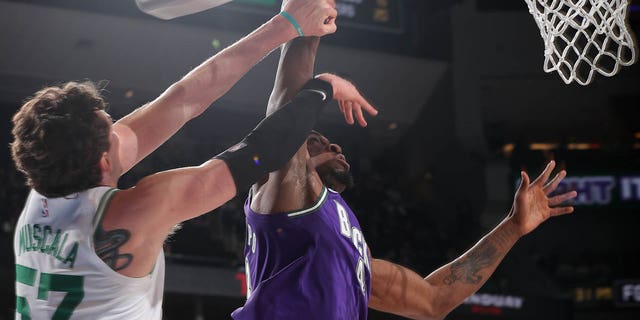 Thanasis Antetokounmpo, #43 of the Milwaukee Bucks, dunks the ball during the game against the Boston Celtics on March 30, 2023 at the Fiserv Forum Center in Milwaukee.