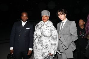 NEW YORK, NEW YORK - FEBRUARY 14: (L-R) Pusha T, Queen Latifah and John Suh attend the Thom Browne fashion show during New York Fashion Week at The Shed on February 14, 2023 in New York City. (Photo by Rob Kim/Getty Images)