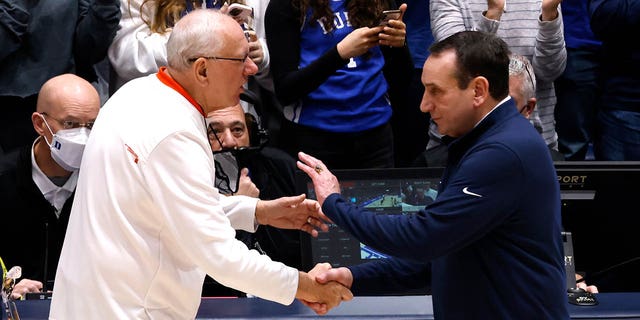 Syracuse coach Jim Boeheim, left, talks with Duke coach Mike Krzyzewski following a game at Cameron Indoor Stadium in Durham, N.C., on Jan. 22, 2022.