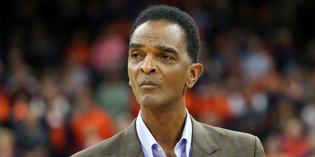 Ralph Sampson accompanies Braxton Key, #2 of the Virginia Cavaliers, during a senior day ceremony before the start of a game against the Louisville Cardinals at John Paul Jones Arena on March 7, 2020 in Charlottesville, Virginia. 