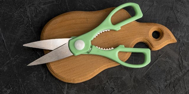 Kitchen shears are a type of sharp scissors that are used to cut food and crack nuts.