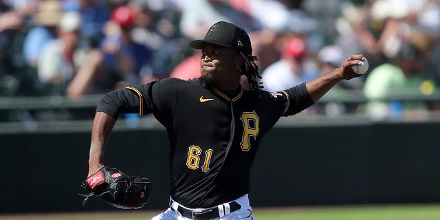 Pittsburgh Pirates pitcher Jose Hernandez (61) delivers a pitch to the plate during the spring training game between the Philadelphia Phillies and the Pittsburgh Pirates on February 27, 2023, at LECOM Park in Bradenton, FL.