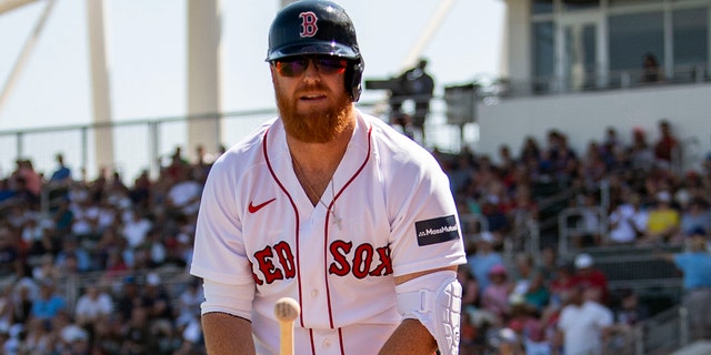 Justin Turner of the Boston Red Sox warms up during the Tampa Bay Rays game on Feb. 26, 2023, in Fort Myers, Florida.