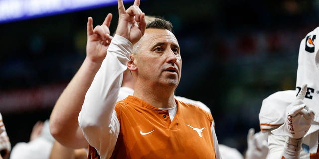 Texas Longhorns head coach Steve Sarkisian sings "The Eyes of Texas" after the Valero Alamo Bowl game against the Washington Huskies at Alamodome on Dec. 29, 2022 in San Antonio.