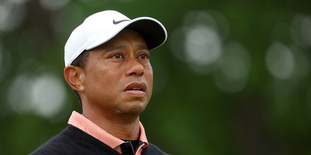 Tiger Woods walks to the fourth tee during the third round of the 2022 PGA Championship at Southern Hills Country Club in Tulsa, Oklahoma, on May 21, 2022.