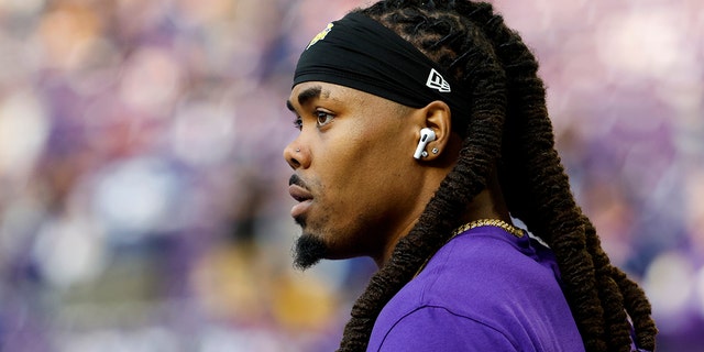 K.J. Osborn #17 of the Minnesota Vikings warms up prior to a game against the New York Giants in the NFC Wild Card playoff game at U.S. Bank Stadium on January 15, 2023 in Minneapolis, Minnesota.