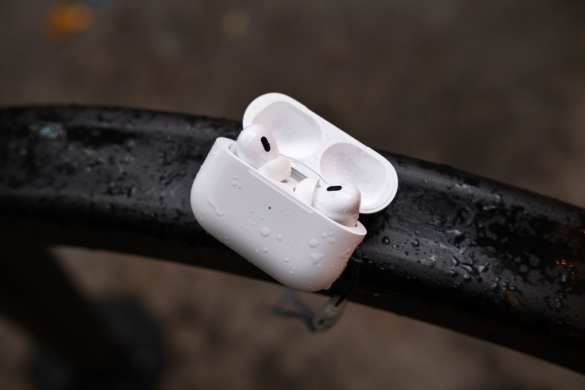 A pair of AirPods in an open charging case