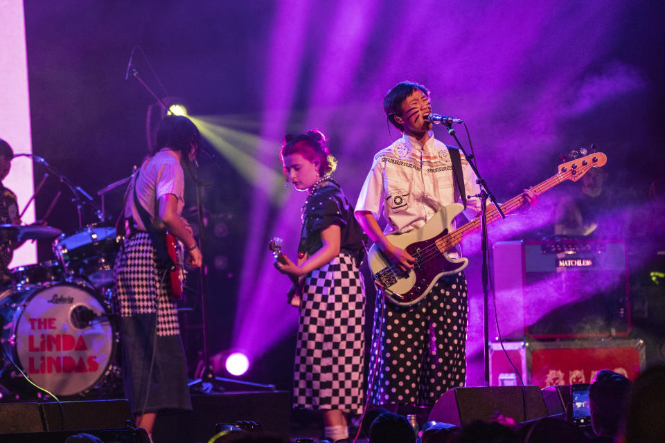 The Linda Lindas perform at Coachella 2023. (Photo: Amy Harris/Invision/AP)