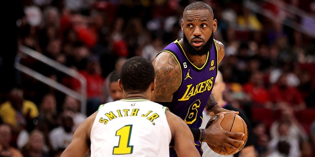 Los Angeles Lakers forward LeBron James handles the ball against the Rockets at Toyota Center in Houston, Texas, on April 3, 2023.