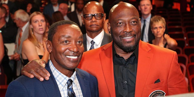 Isiah Thomas and Mitch Richmond pose for a photo during the 2022 Basketball Hall of Fame enshrinement ceremony Sept. 10, 2022, at Symphony Hall in Springfield, Mass. 