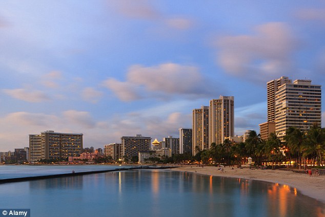 Hawaii was the only state with a life expectancy greater than 80 and was also the fourth most healthy, according to federal data. Pictured is the famous Waikiki Beach in Honolulu