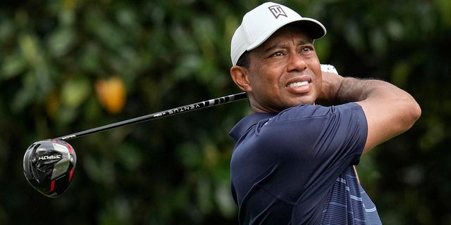 Tiger Woods watches his tee shot at the Masters on Friday, April 7, 2023, in Augusta, Georgia.