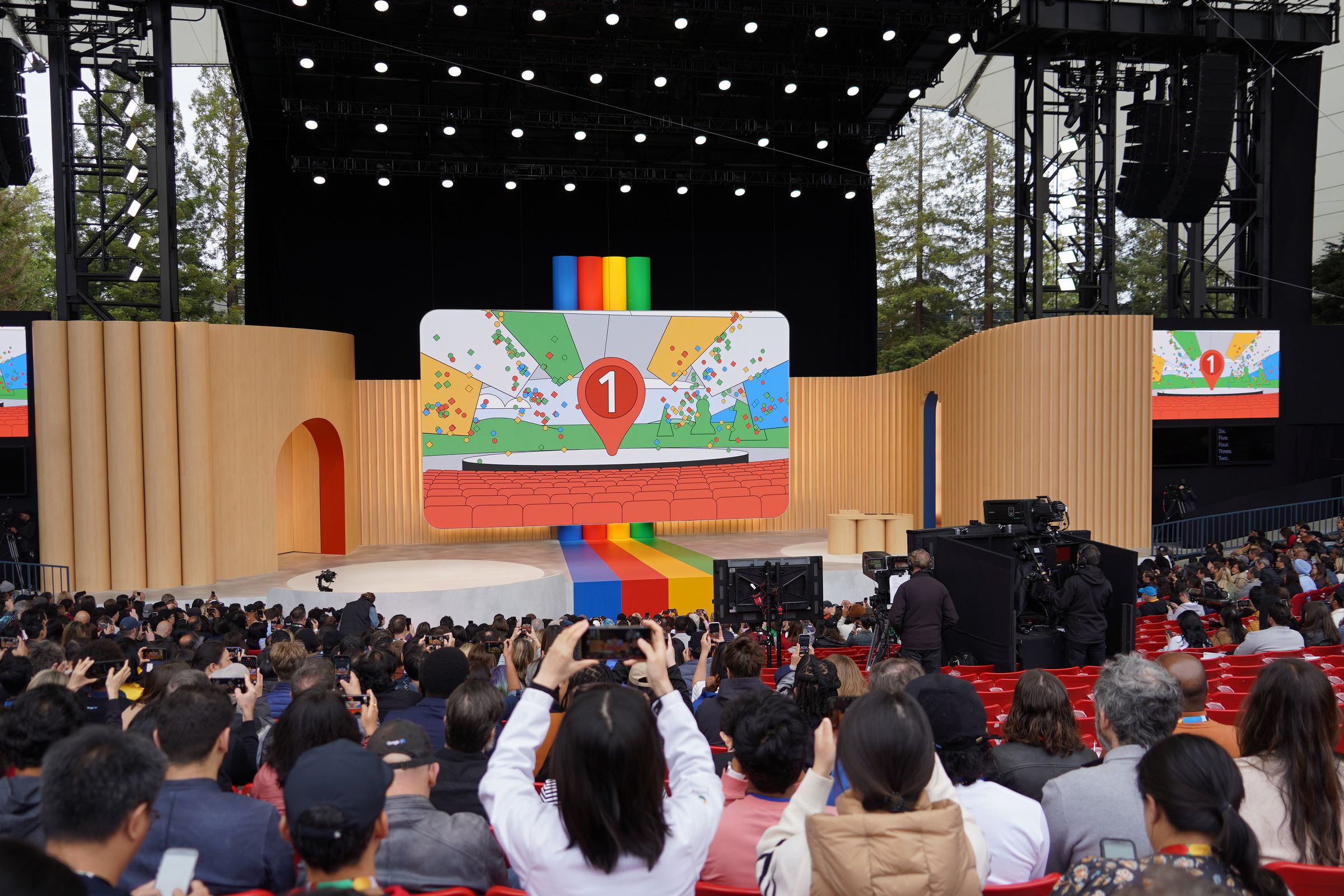 Crowd and stage at Google I/O keynote 2023 just before the presentation begins.