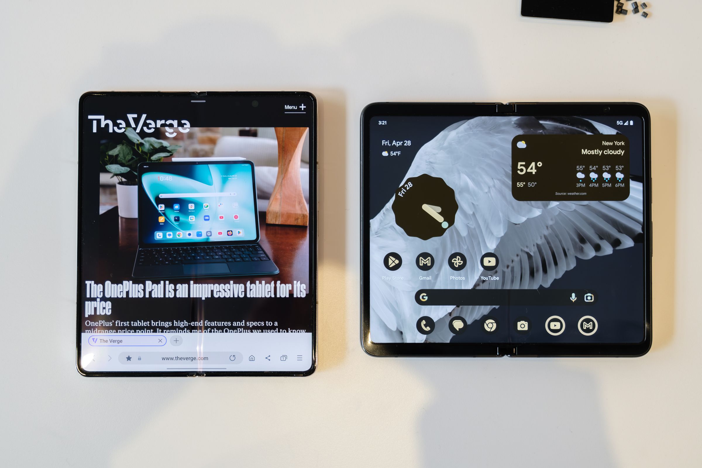 A Samsung Galaxy Z Fold 4 next to the Google Pixel Fold.