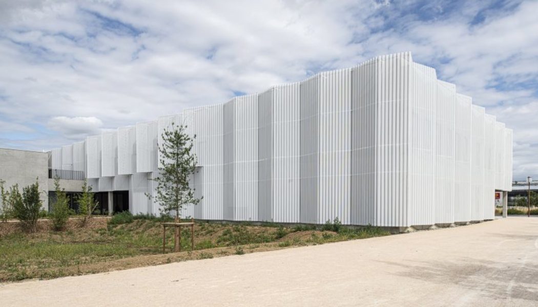 Conservatoire of Music and Dance by PPA Architectures features pleated metal sunscreen