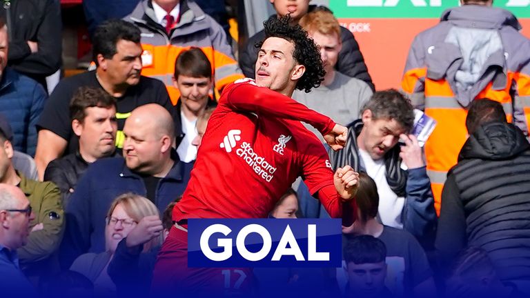 Curtis Jones volleys in an early opening goal for Liverpool against Tottenham at Anfield. 