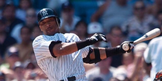 Gary Sheffield finishes swing