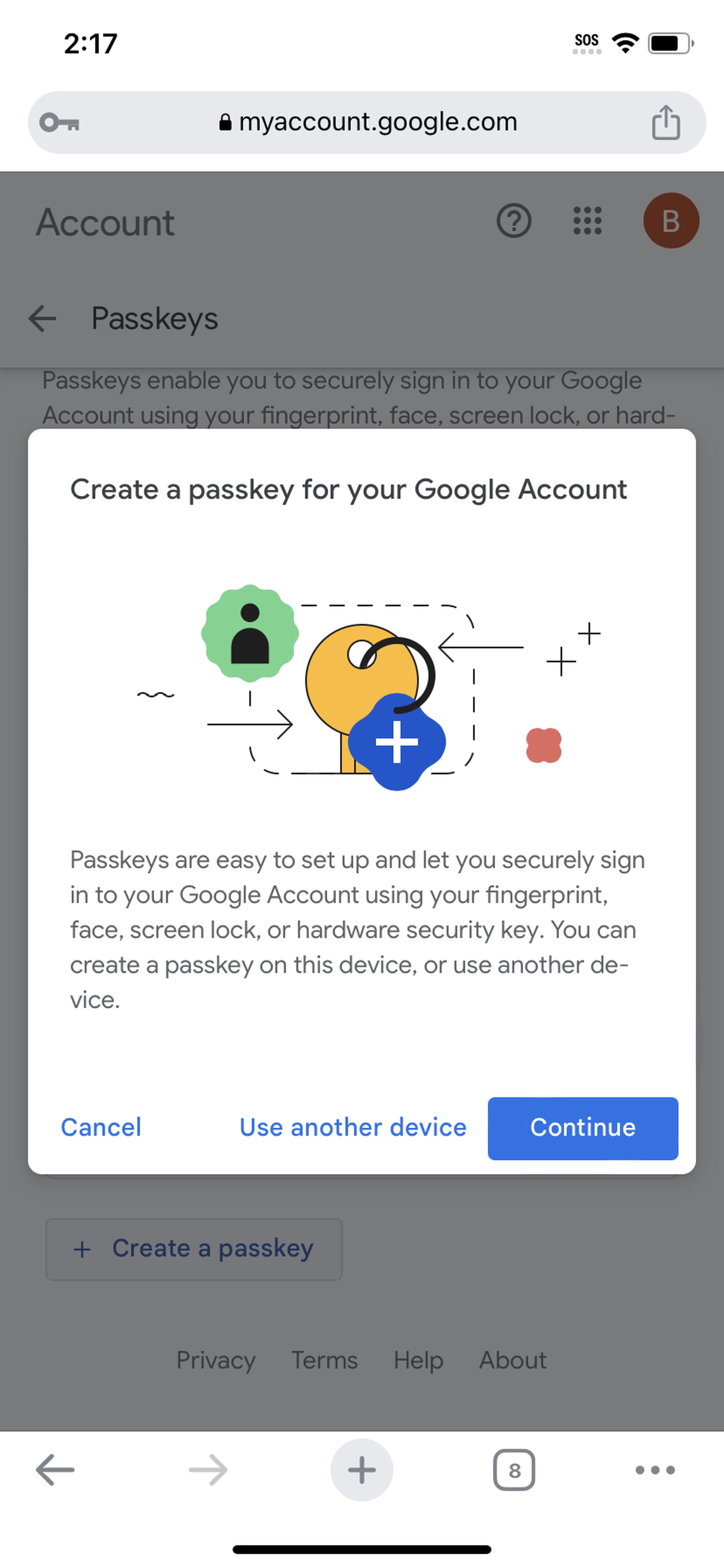 Mobile screen with pop-up window headed Create a passkey for your Google Account.