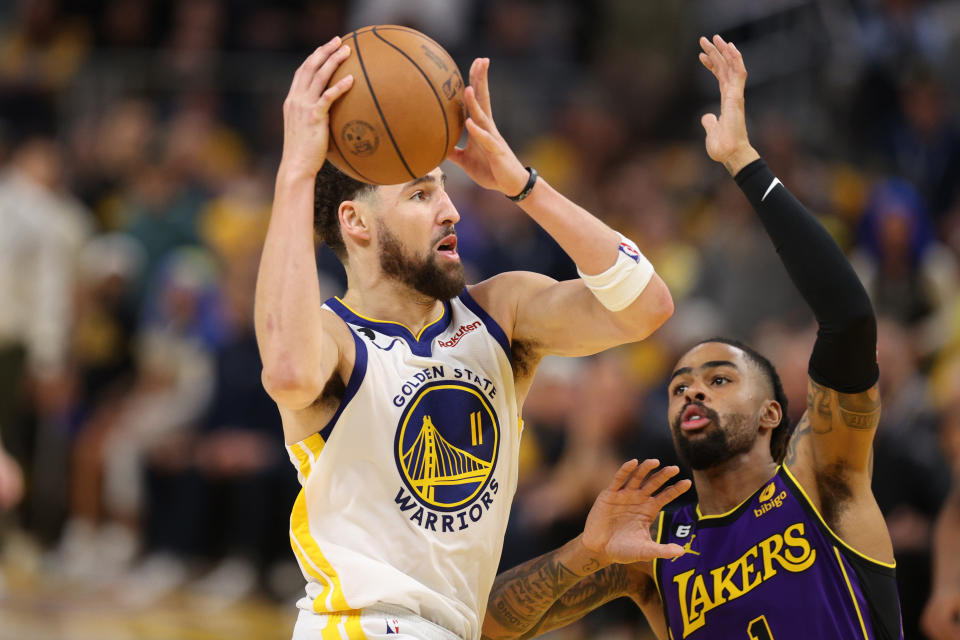 Golden State Warriors guard Klay Thompson drives against D&#39;Angelo Russell of the Los Angeles Lakers during the fourth quarter in Game 2 of the Western Conference semifinal series at Chase Center in San Francisco on May 4, 2023. (Ezra Shaw/Getty Images)