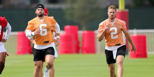 Tampa Bay Buccaneers quarterbacks throw during practice