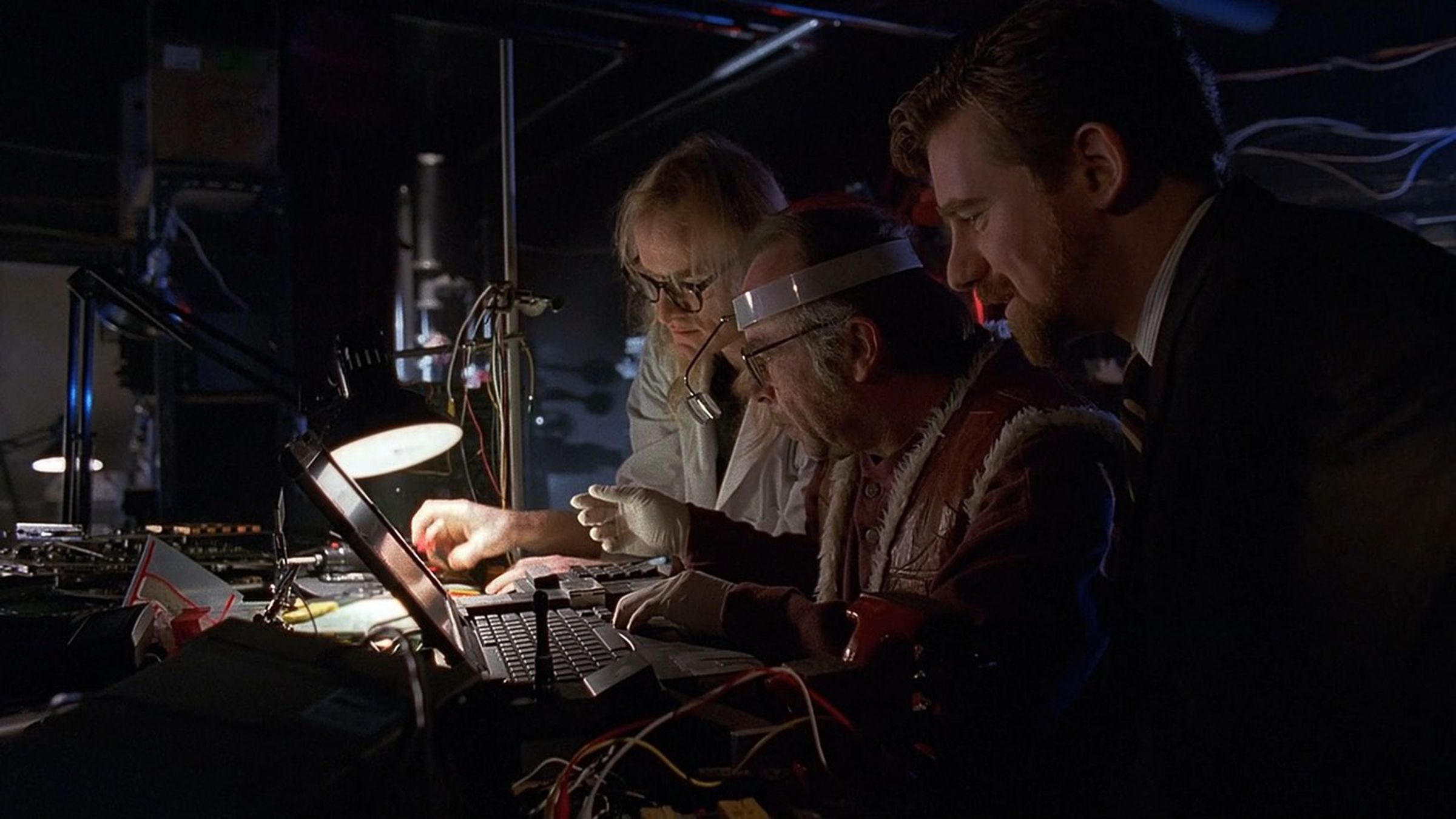 A still photo of The Lone Gunmen in The X-Files episode “Kill Switch.”