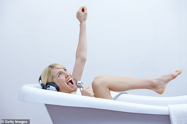 A good sing-song in the bath or shower lifts the spirits and increases the flow of oxygenated blood to the brain even when warbling alone (stock image)