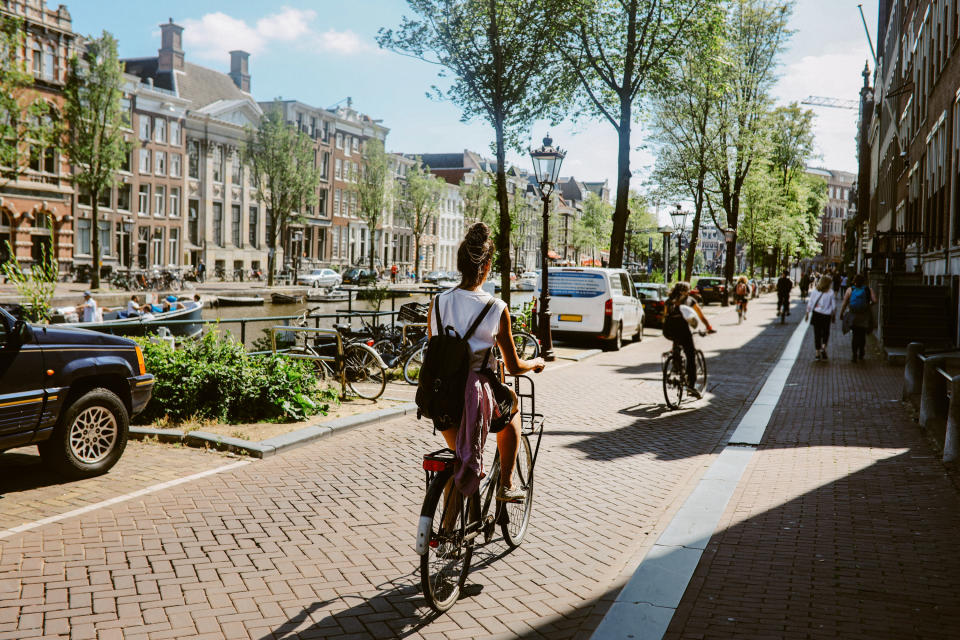 woman cycling in amsterdam