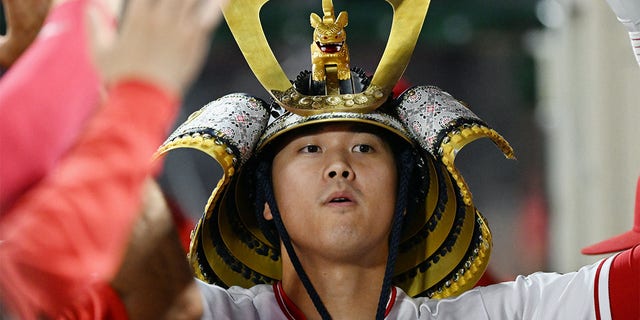 Shohei Ohtani celebrates after his fifth inning home run